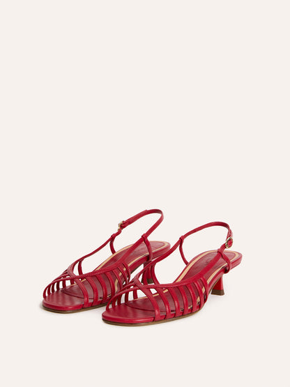 LOREN red leather kitten heel sandals worn on a model by Rouje