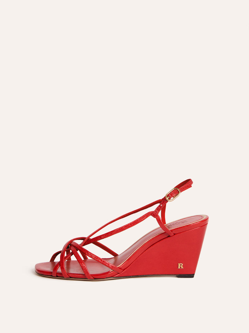 NINE red leather cross-strap wedge sandals, front view by Rouje