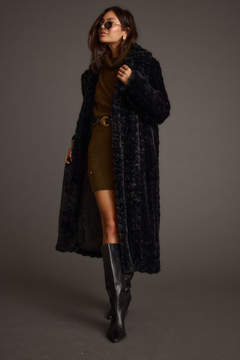 Sasha Black Floor Length Coat styled in a complete look from an alternate angle.
