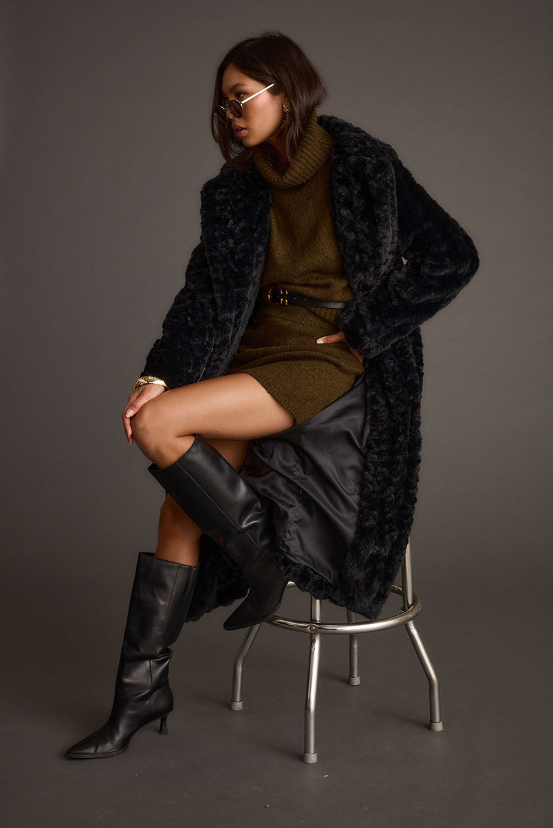 Sasha Black Floor Length Coat paired with complementary accessories for a polished look.