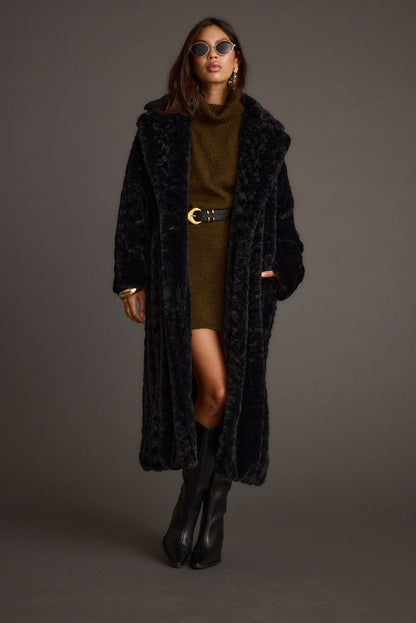 Detail shot of the Sasha Black Floor Length Coat highlighting the design elements.
