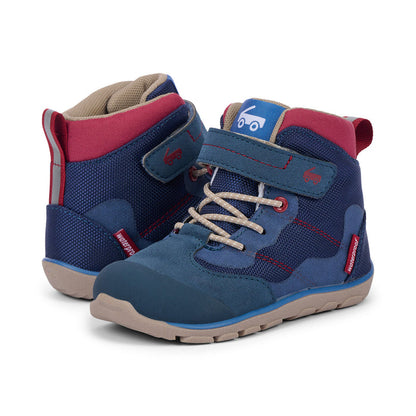 Pair of blue children's boots with red and beige accents on a white background