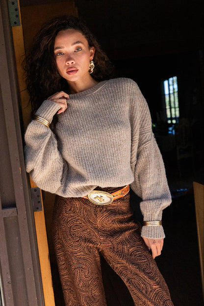 Back view of the sweater showing the silhouette and fit.