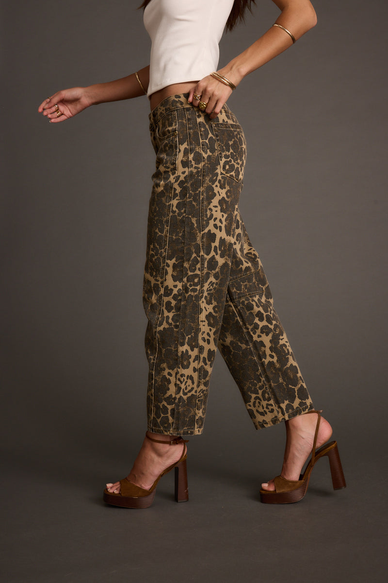 Back view of the leopard print jeans showing the silhouette and fit.