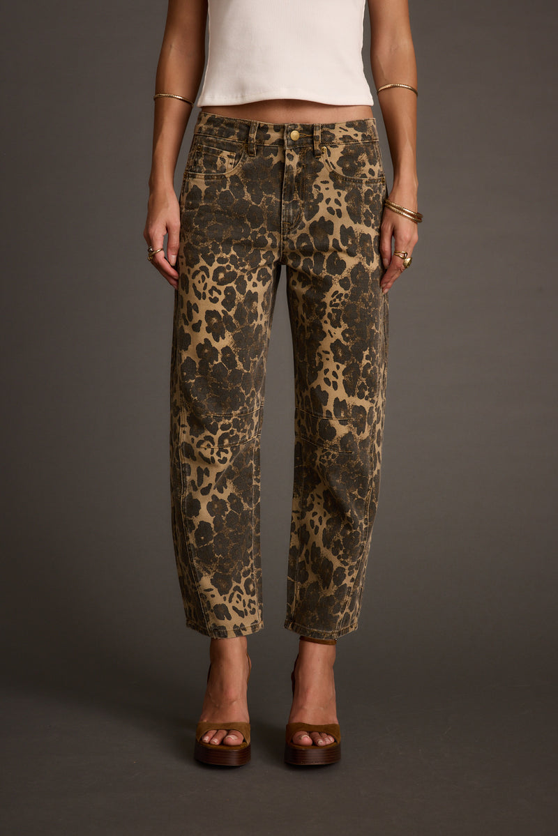 Leopard print jeans with refined detailing and a flattering silhouette.