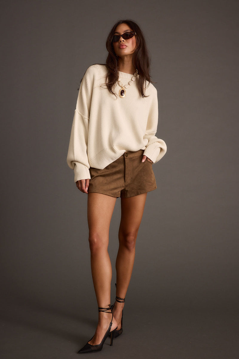 Back view of the piece showing the silhouette and fit.