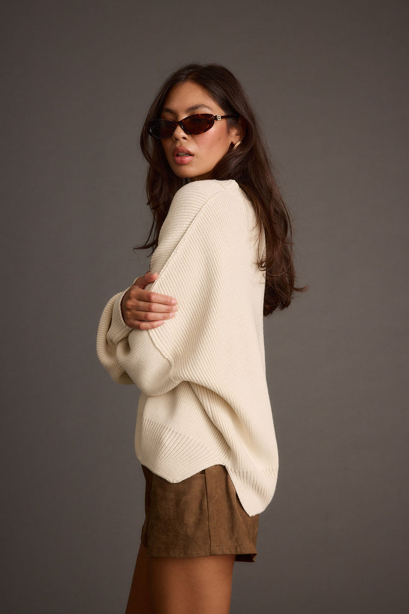 Full-length view of the piece showing the drape and movement.