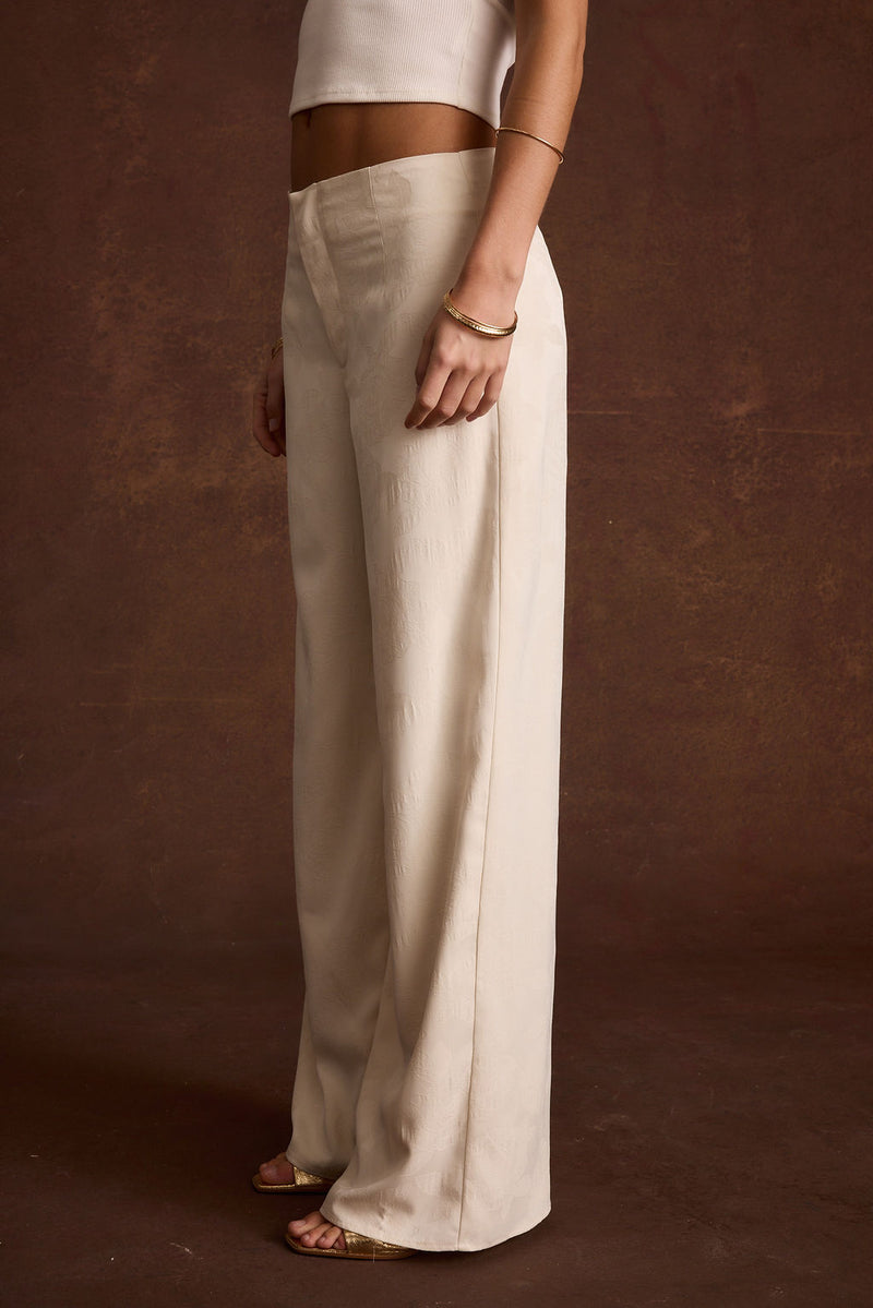 Full-length view of the piece showing the drape and movement.
