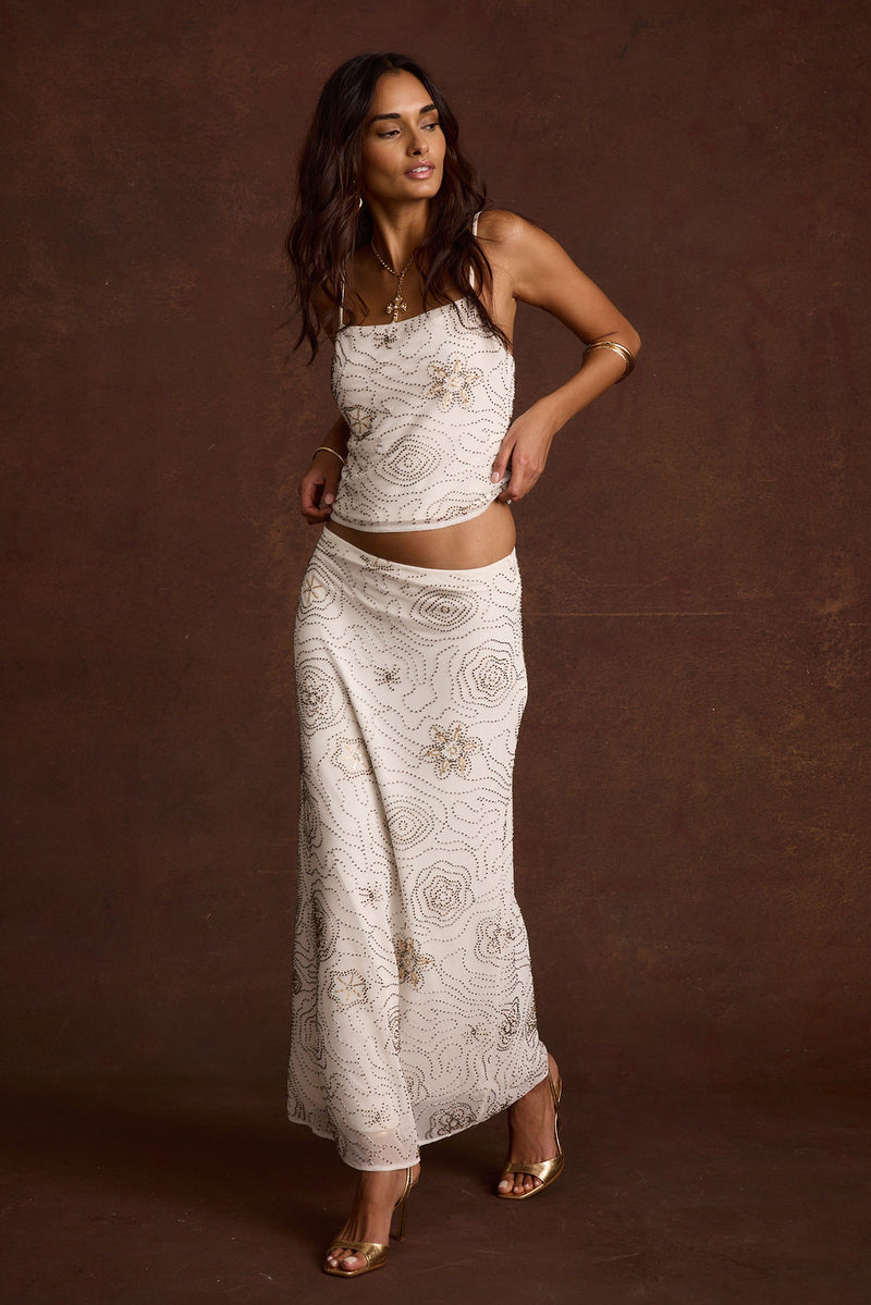Full-length view of the piece showing the drape and movement.