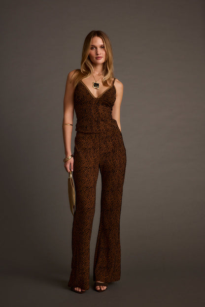 Full-length view of the cognac piece showing the drape and movement.
