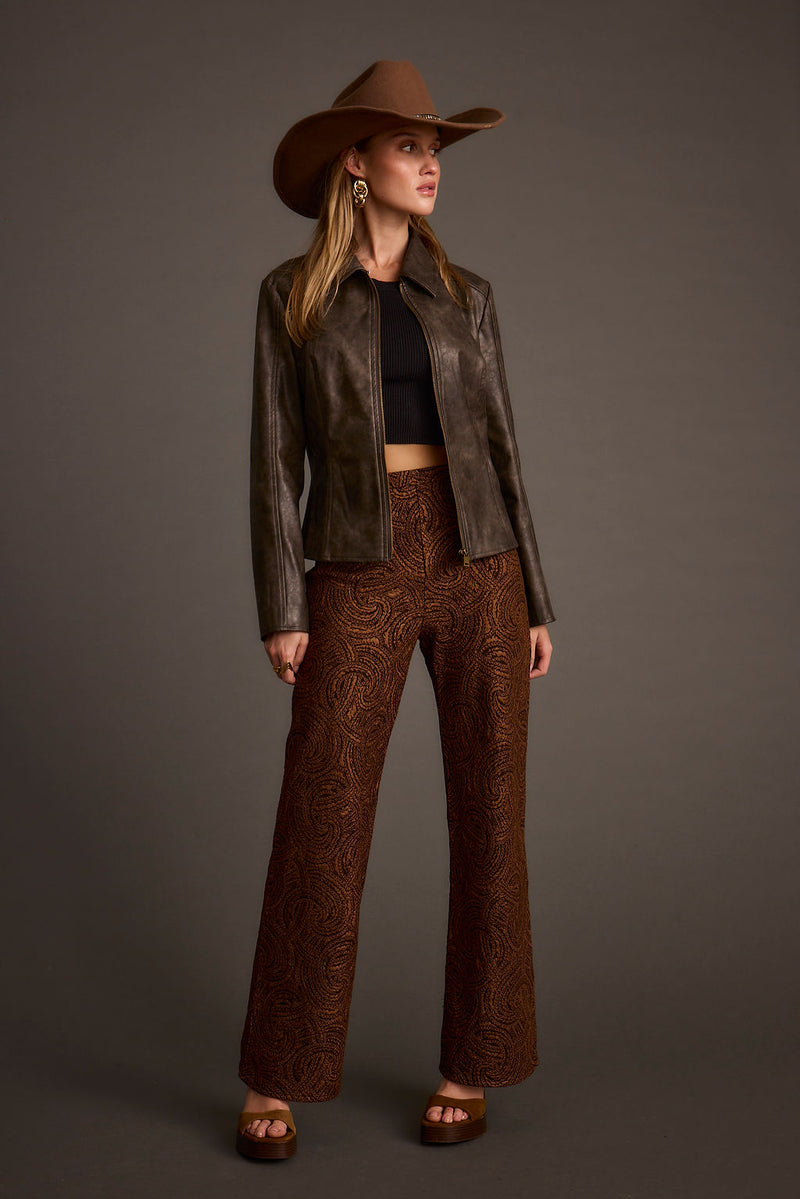 Back view of the piece showing the silhouette and fit.