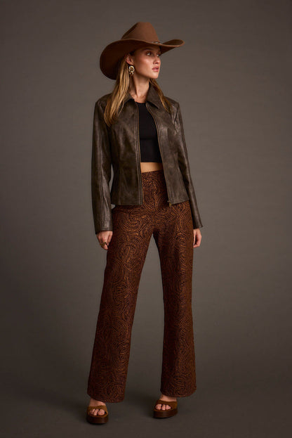 Back view of the piece showing the silhouette and fit.