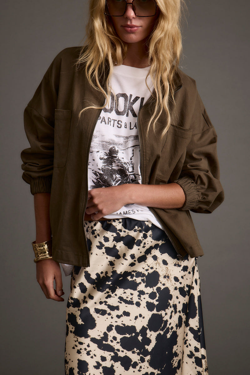 Close-up of the Fairfax Olive Canvas Relaxed Fit Utility Jacket showcasing the fabric texture and design details.