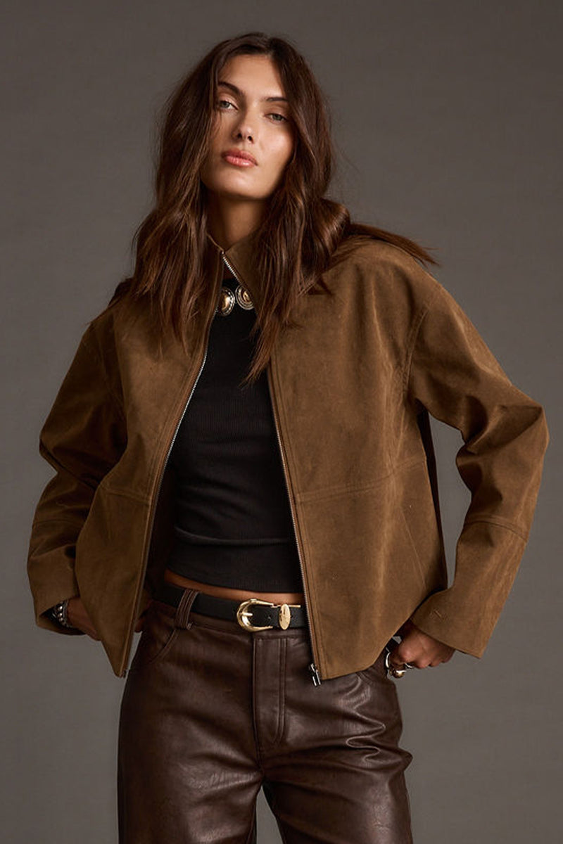 Brown jacket with refined detailing and a flattering silhouette.