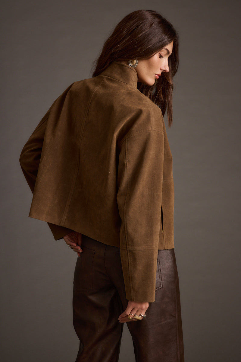 Back view of the brown jacket showing the silhouette and fit.