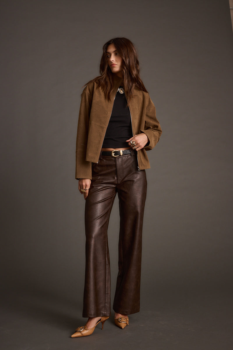 Close-up of the Sienna Brown Vegan Suede Jacket showcasing the fabric texture and design details.