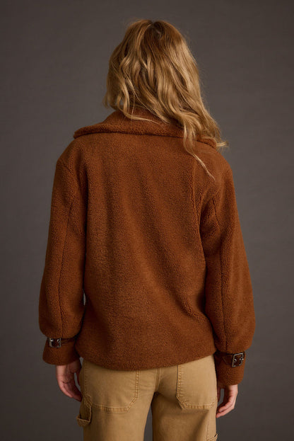 Full-length view of the mocha jacket showing the drape and movement.