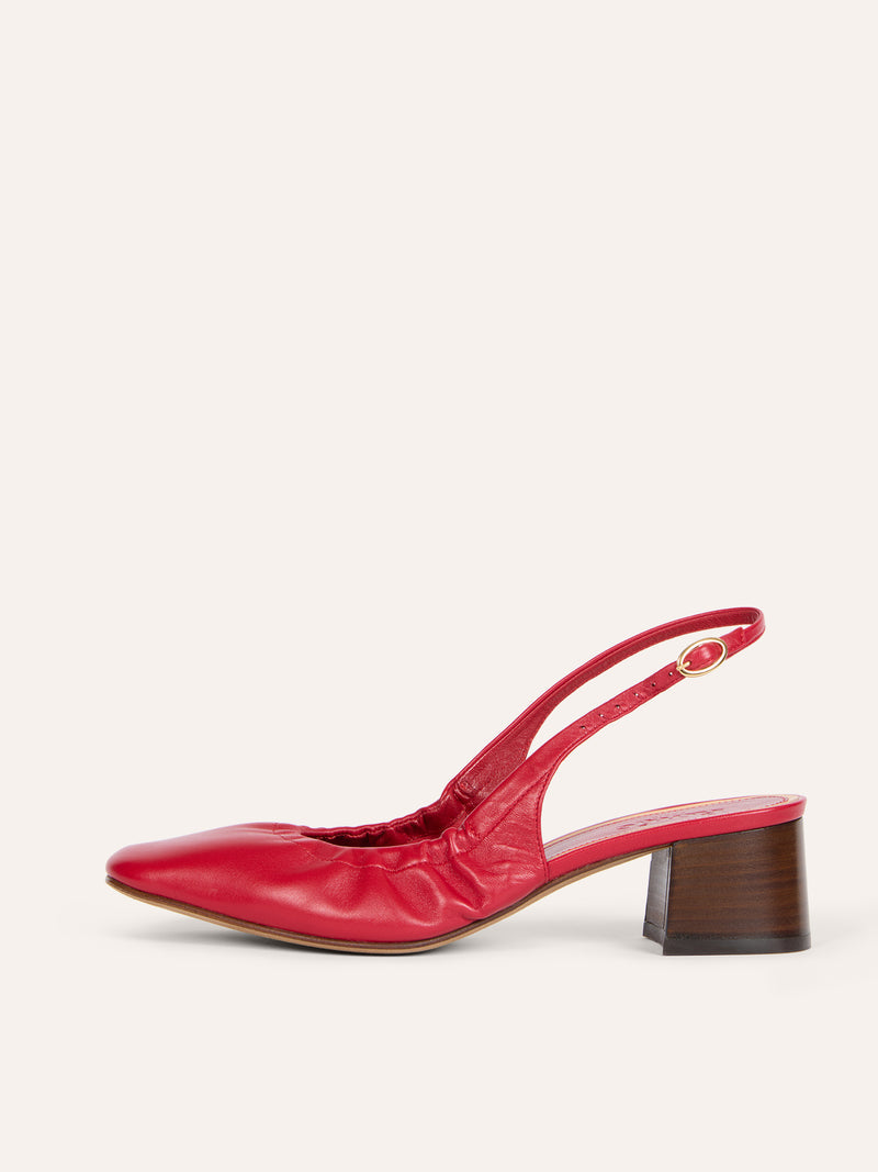 CATALANE red lambskin slingback pumps worn on a model by Rouje