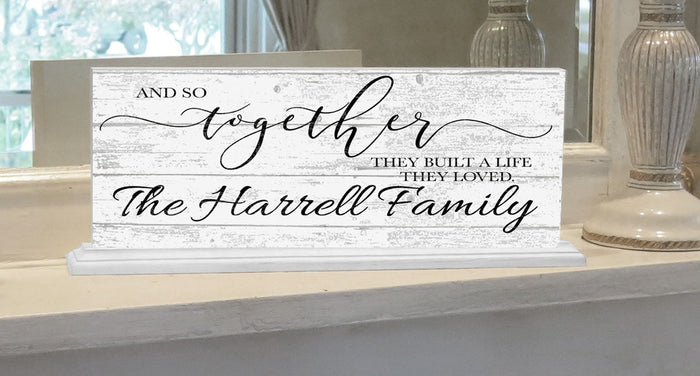 And So Together They Built A Life They Loved sign
