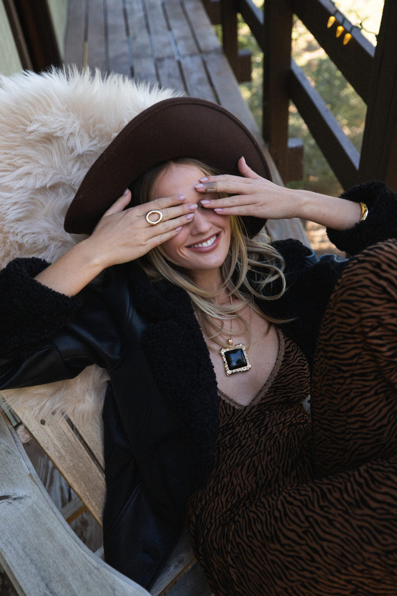 Soleil Statement Necklace shown from a different angle, highlighting the metalwork details.
