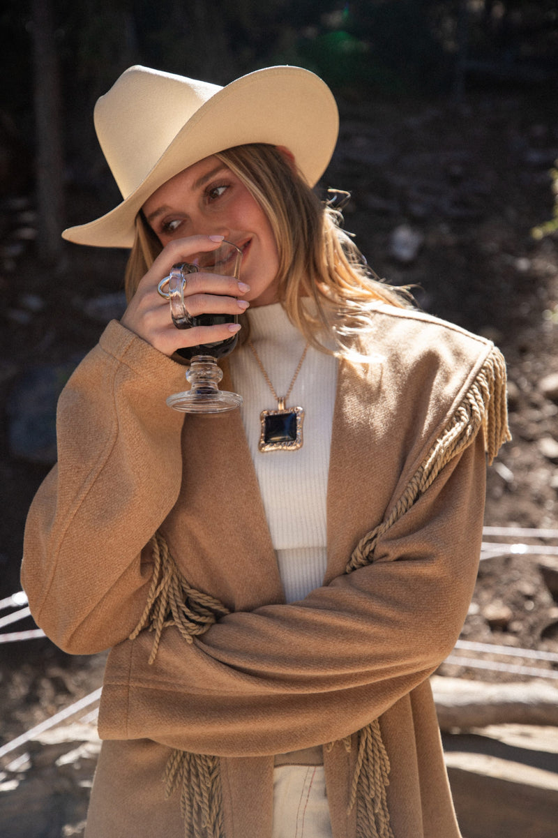 Soleil Statement Necklace shown as part of a styled outfit ensemble.