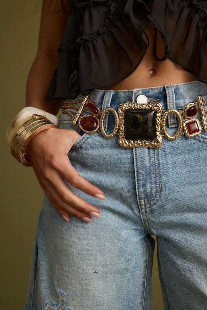 Alternate view of the gold belt showing the design and craftsmanship.
