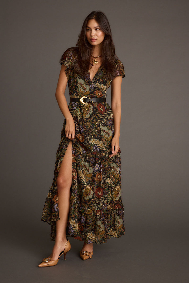 Back view of the floral maxi dress showing the silhouette and fit.