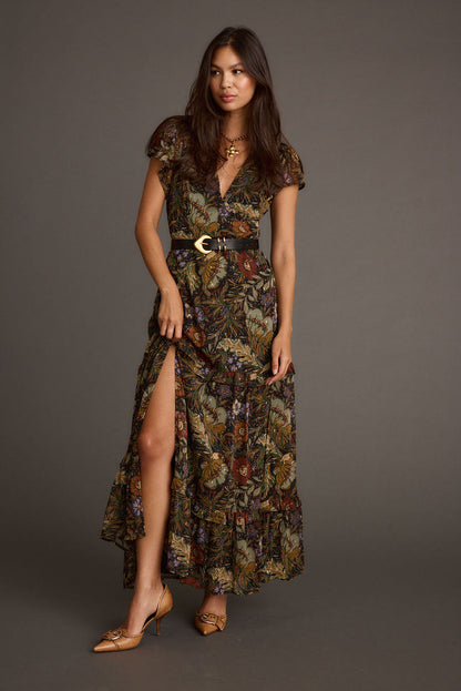 Back view of the floral maxi dress showing the silhouette and fit.