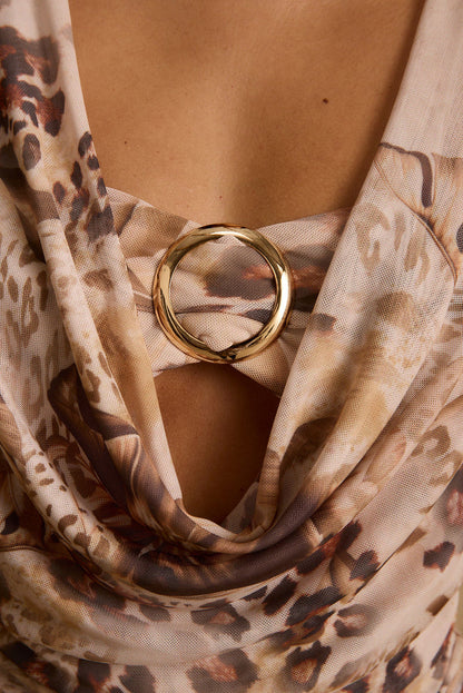 Sundown Animal Cowl Neck Blouse paired with complementary accessories for a polished look.
