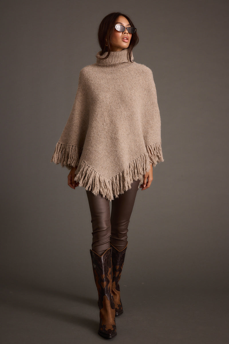 Back view of the sweater showing the silhouette and fit.