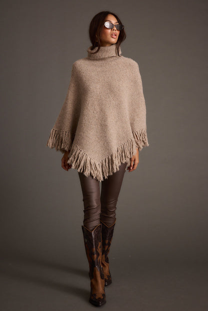 Back view of the sweater showing the silhouette and fit.