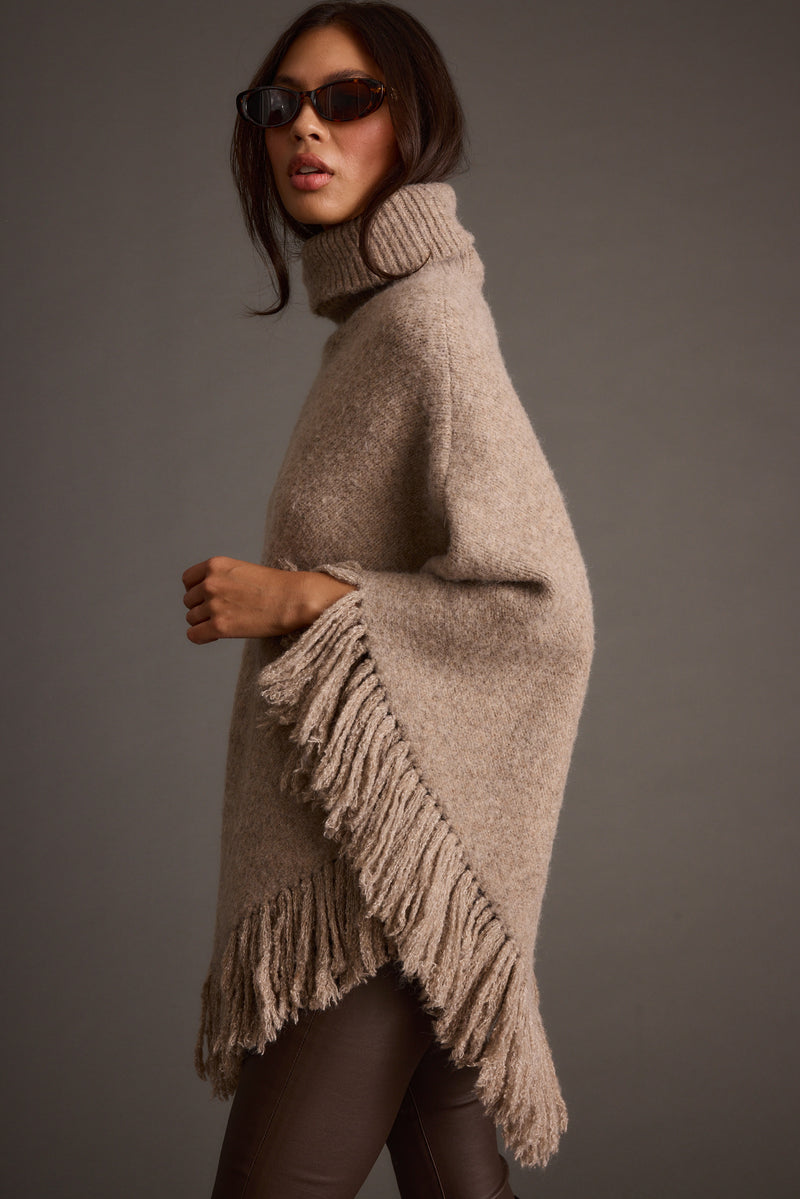 Tabitha Dark Taupe Poncho styled in a complete look from an alternate angle.