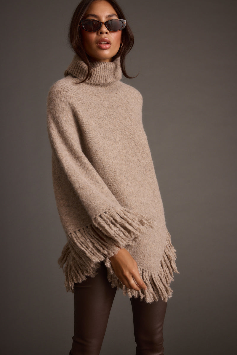Tabitha Dark Taupe Poncho paired with complementary accessories for a polished look.