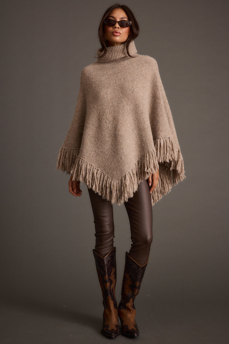 Detail shot of the Tabitha Dark Taupe Poncho highlighting the design elements.