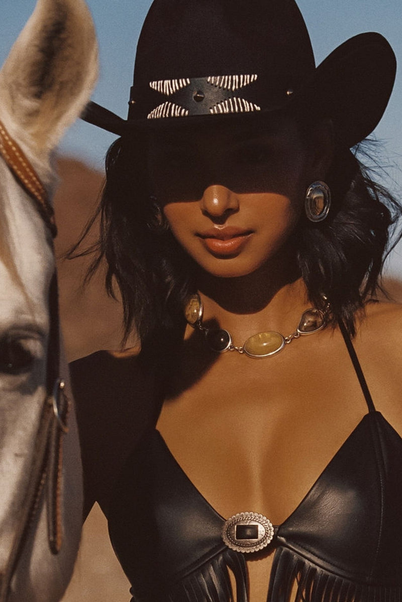 Close-up of the Talon Black Suede Cowboy Hat showcasing the fabric texture and design details.
