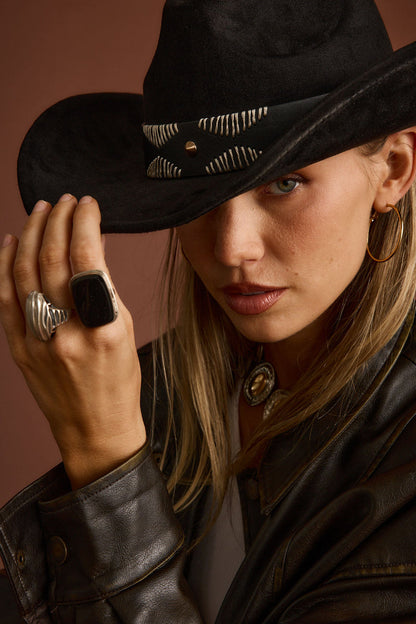 Talon Black Suede Cowboy Hat paired with complementary accessories for a polished look.