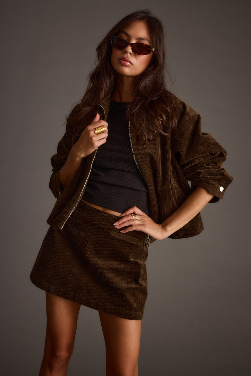 Additional view of the Tavern Mocha Corduroy Mini Skirt from a different perspective.