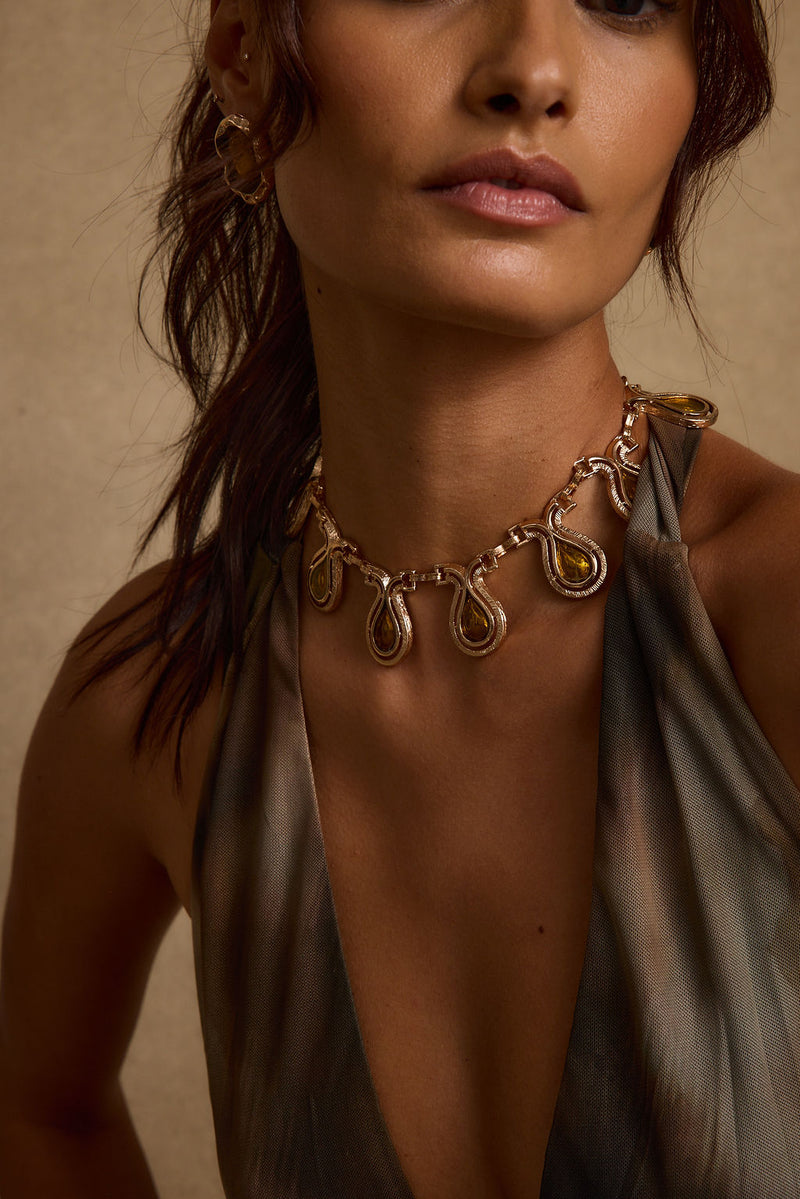 Tavi Gold Choker styled in a complete look from an alternate angle.