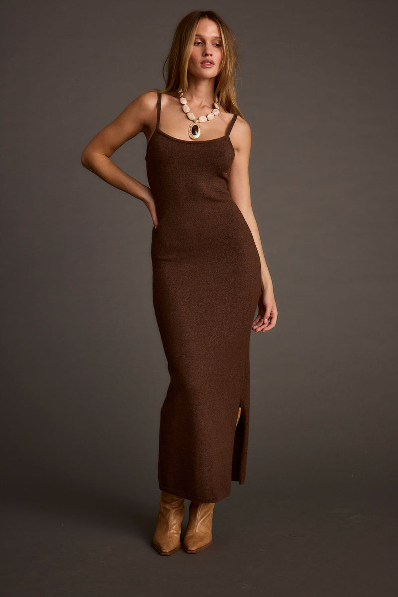 Full-length view of the mocha midi dress showing the drape and movement.