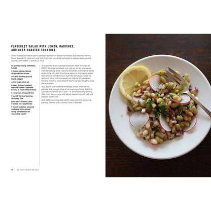 Plated salad with lemon, radishes, and oven-roasted tomatoes on a white plate with a fork, next to a recipe text.