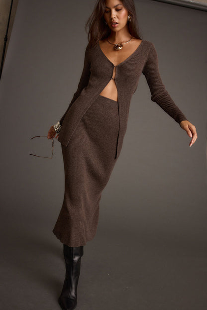 Full-length view of the mocha sweater showing the drape and movement.