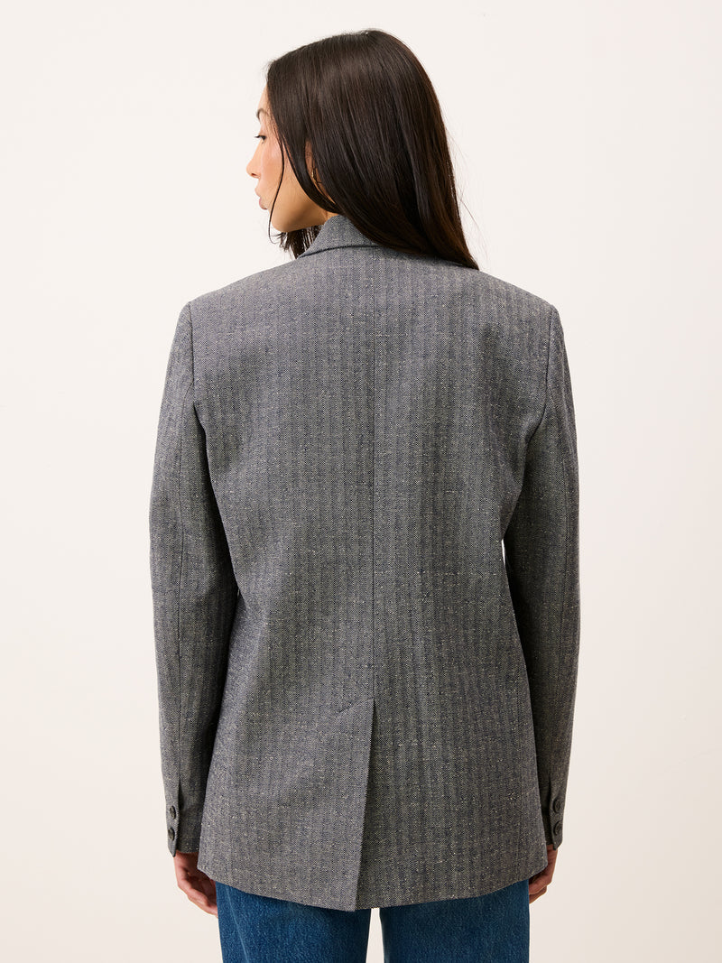 LAMBERT navy herringbone jacket, detail of three-button closure by Rouje