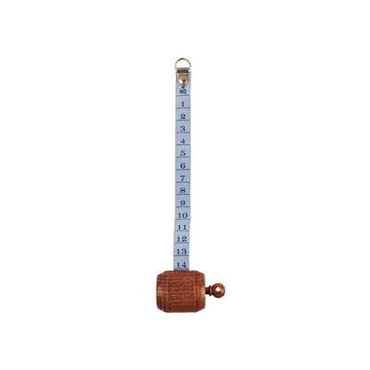 Wooden measuring tape with blue ribbon unfurled.